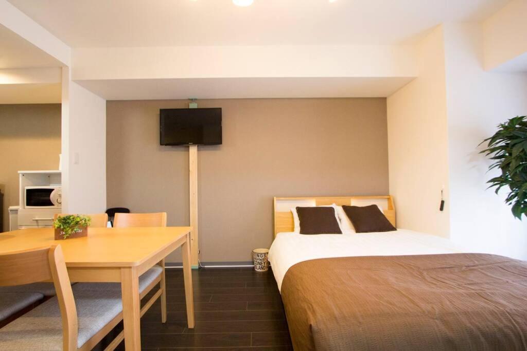 Appartement ようこそ札幌へ! 大通公園まで地下鉄10分 定員6名 Firetv完備 1階はセコマ Extérieur photo