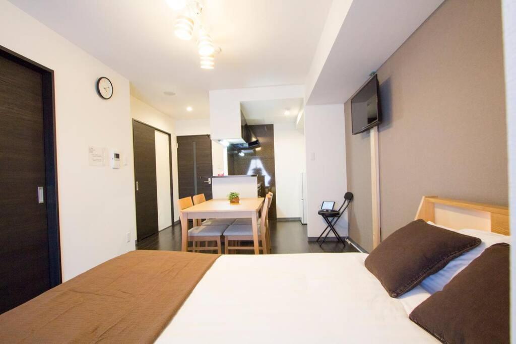 Appartement ようこそ札幌へ! 大通公園まで地下鉄10分 定員6名 Firetv完備 1階はセコマ Extérieur photo