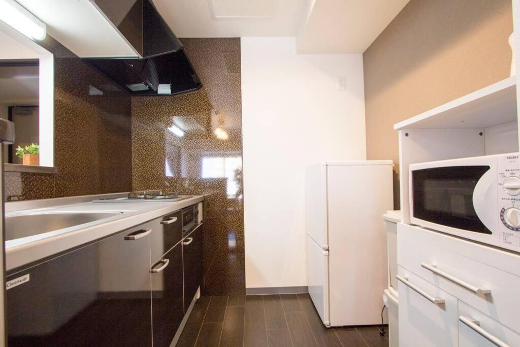 Appartement ようこそ札幌へ! 大通公園まで地下鉄10分 定員6名 Firetv完備 1階はセコマ Extérieur photo
